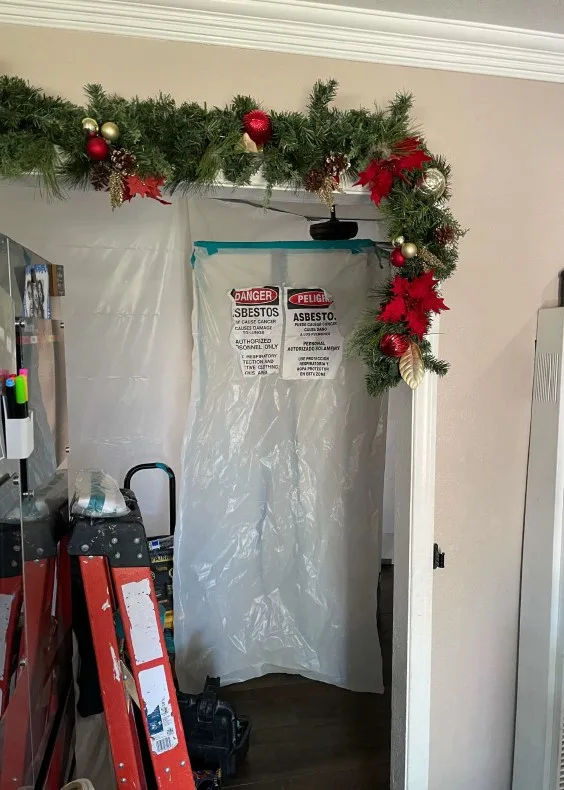 PropCheck Environmental asbestos containment set up inside a Yorba Linda, CA home