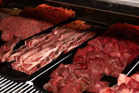 Fresh beef cuts in the butcher display case at Desi Dhaba in Corona, CA