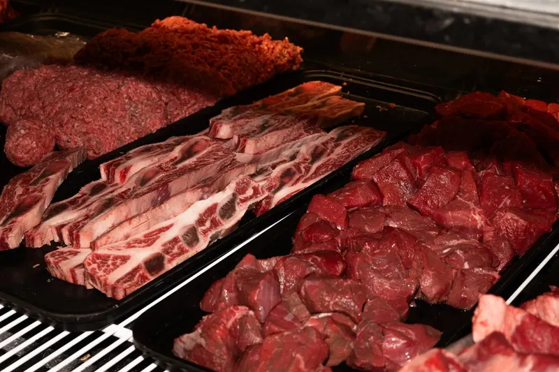 Fresh beef cuts in the butcher display case at Desi Dhaba in Corona, CA